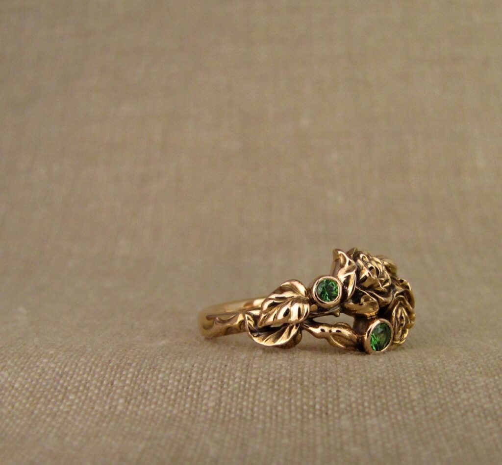 Pair of Roses ring in 19K rose gold, set with tsavorite garnets, cheyenne weil jewelry