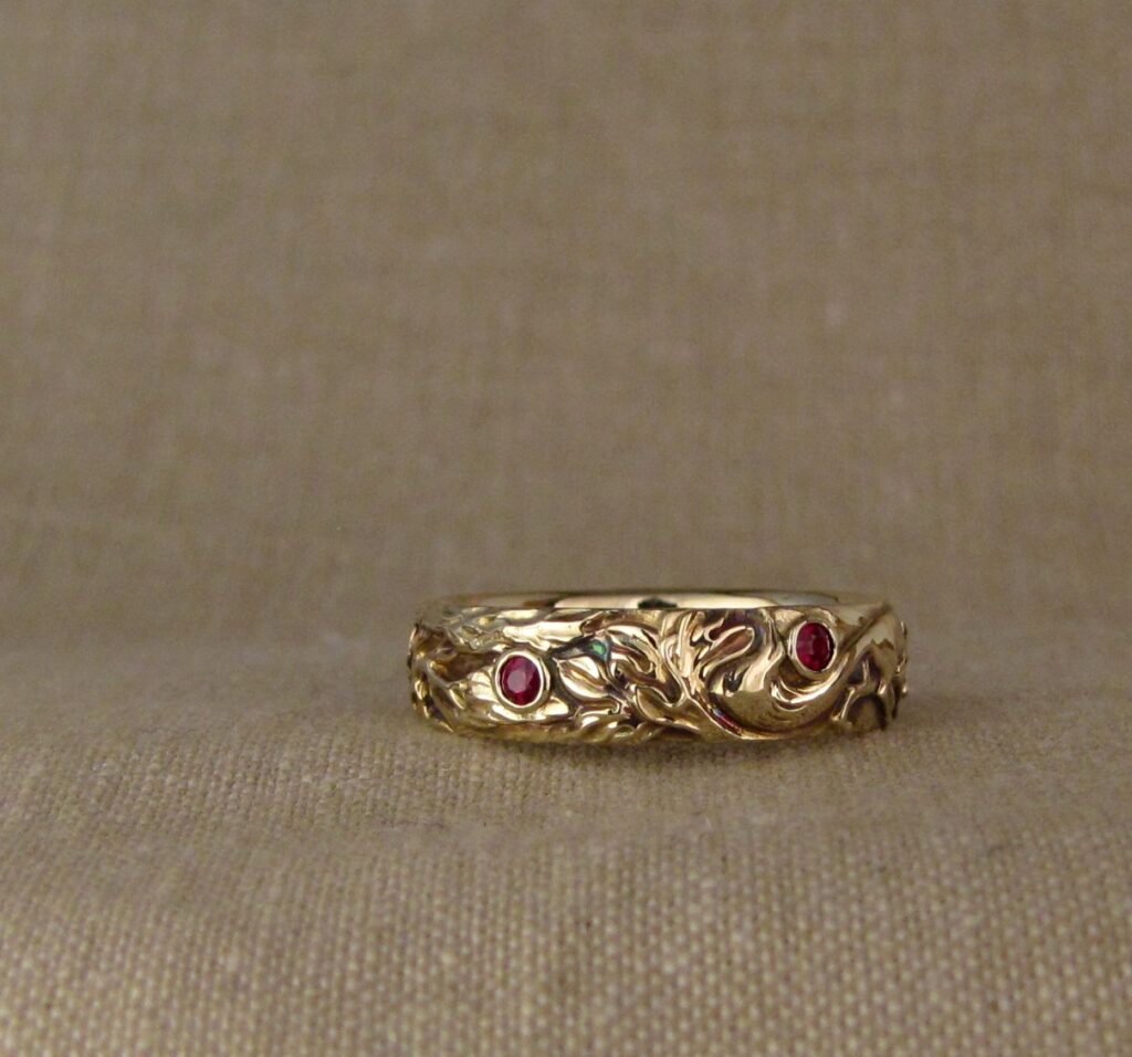 Wedding band carved with fox, tree of life, oak leaves, rococo-leaf motif, set with rubies, 14K gold, cheyenne weil jewelry