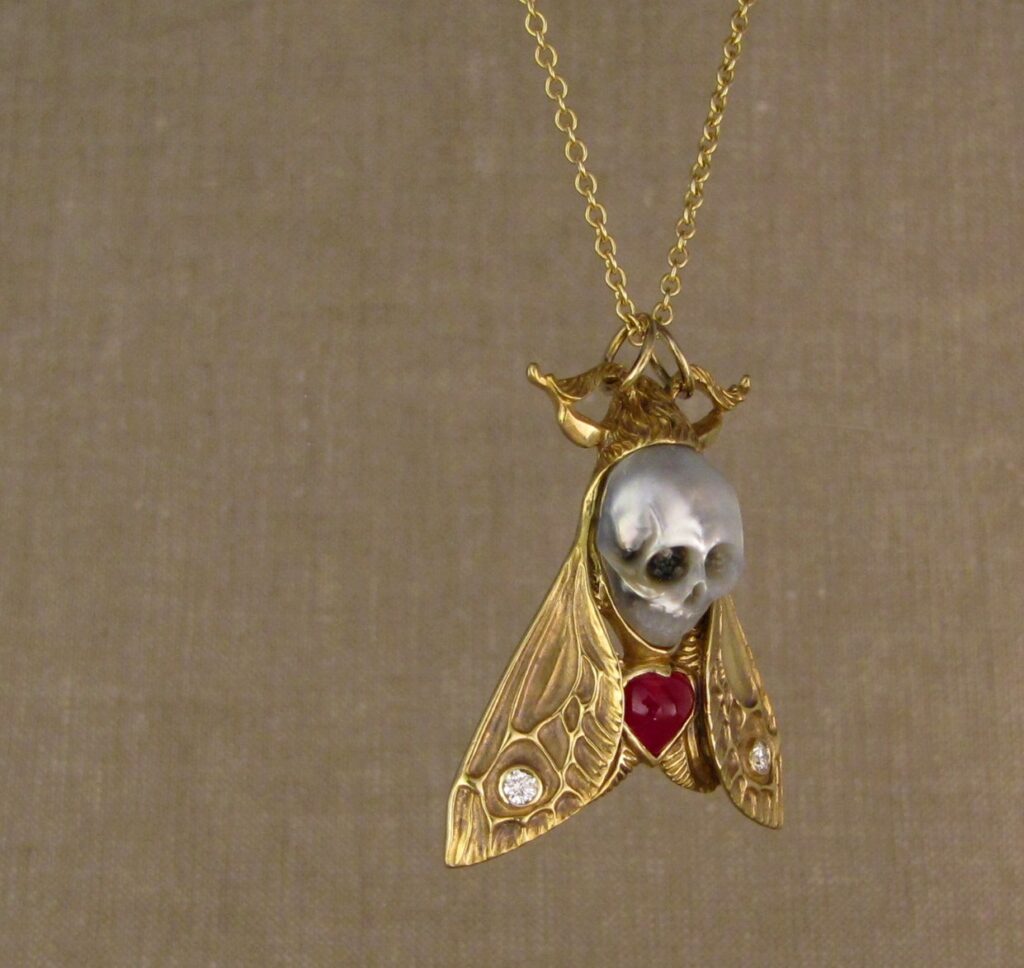 Hand-carved Death's Head Hawkmoth Memento Mori pendant, carved pearl skull, ruby, diamonds, 18K, cheyenne weil jewelry