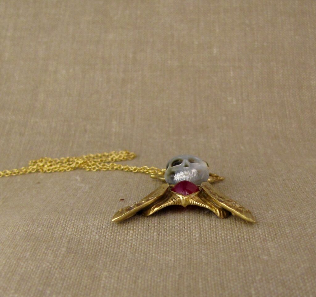 Hand-carved Death's Head Hawkmoth Memento Mori pendant, carved pearl skull, ruby, diamonds, 18K, cheyenne weil jewelry