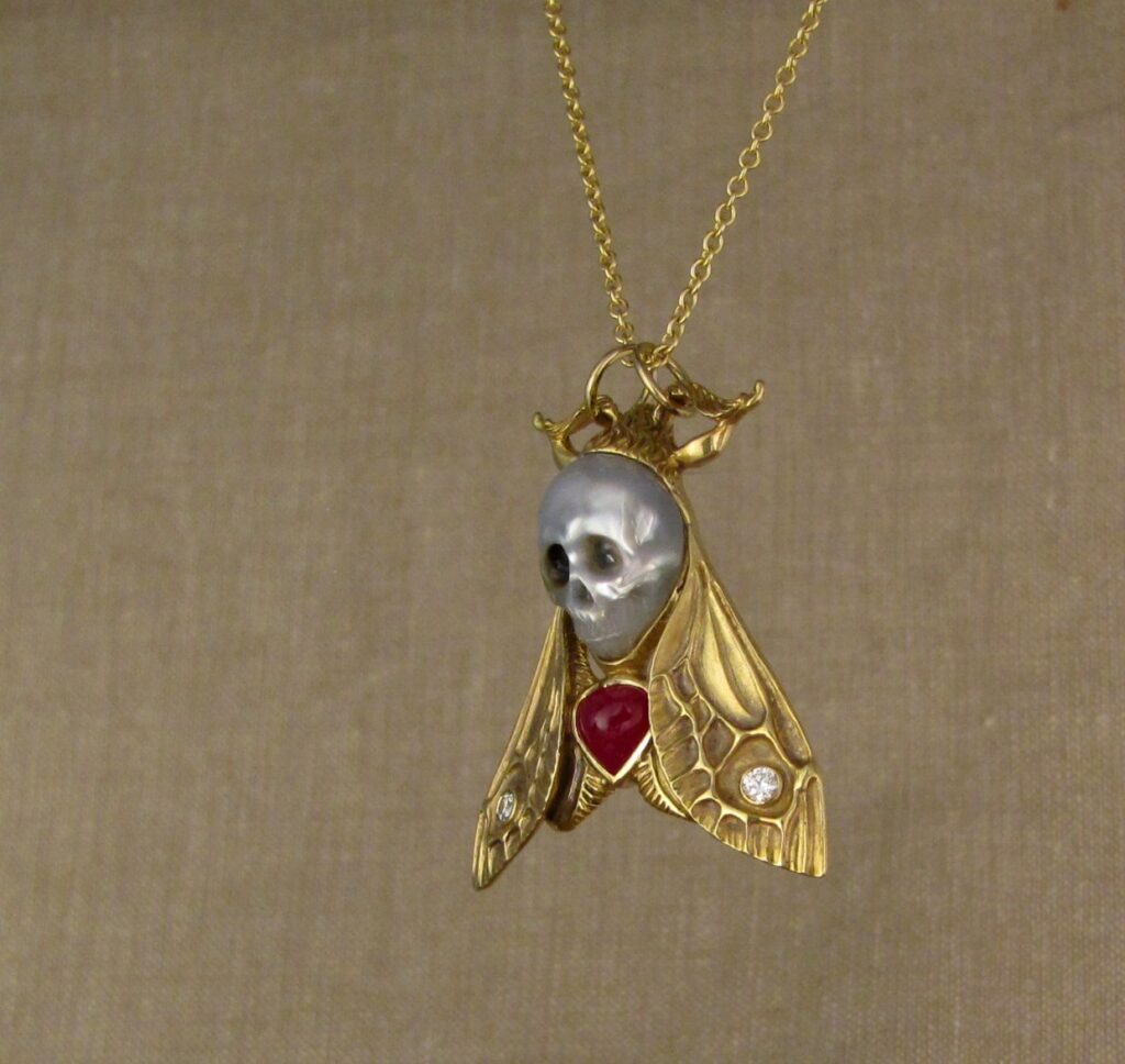 Hand-carved Death's Head Hawkmoth Memento Mori pendant, carved pearl skull, ruby, diamonds, 18K, cheyenne weil jewelry