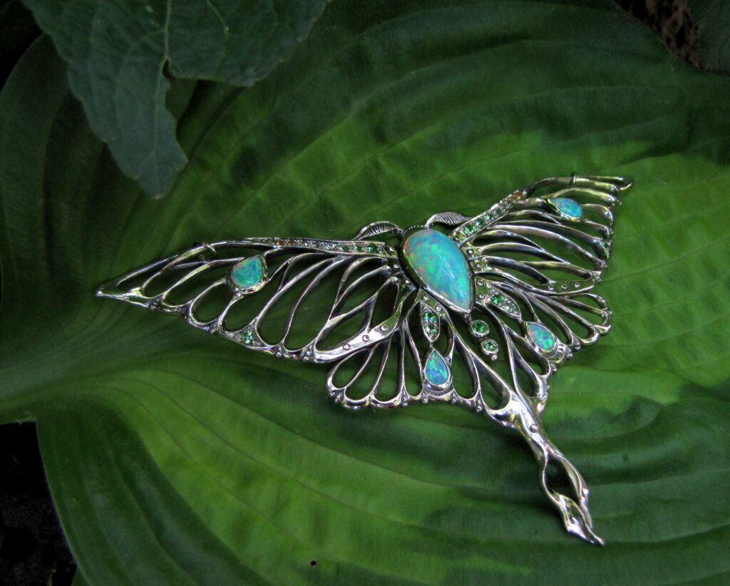 Luna Moth pendant/neckpiece with opals, sapphires, and tsavorite garnets, 14K white gold. cheyenne weil jewelry