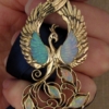 Phoenix pendant with opals