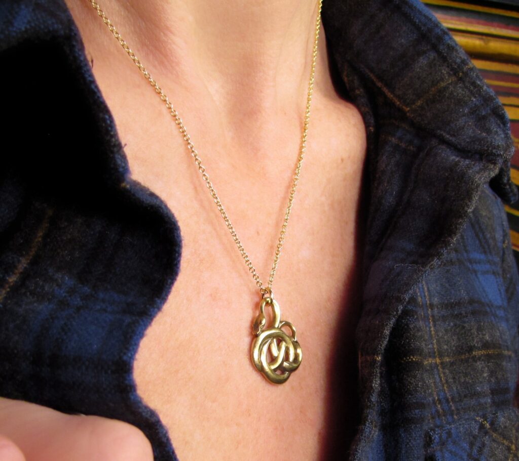 Curling Snake pendant, 18K gold, cheyenne weil jewelry