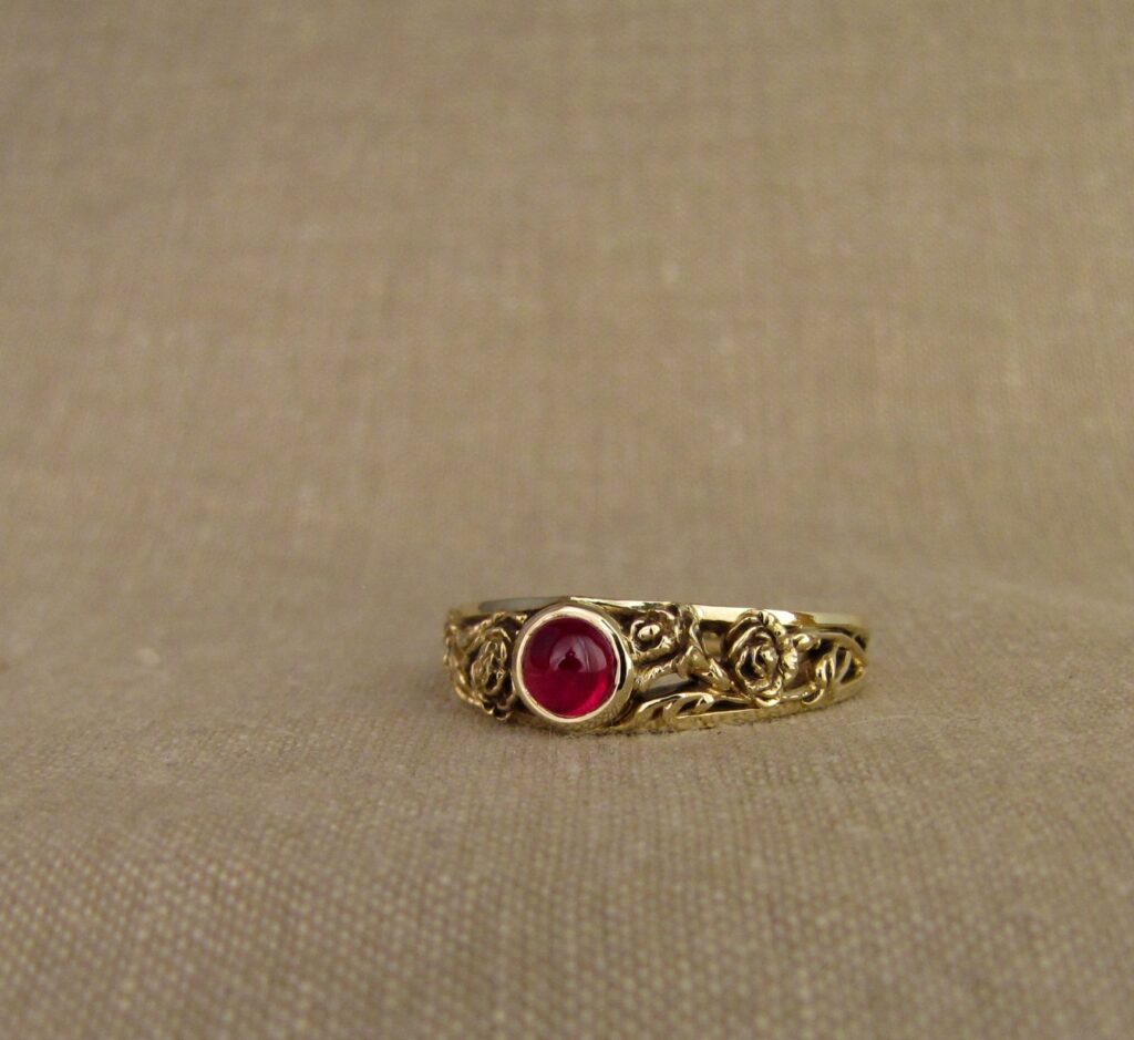 Custom designed & hand-carved Carnations solitaire with cabochon ruby, 14K gold, cheyenne weil