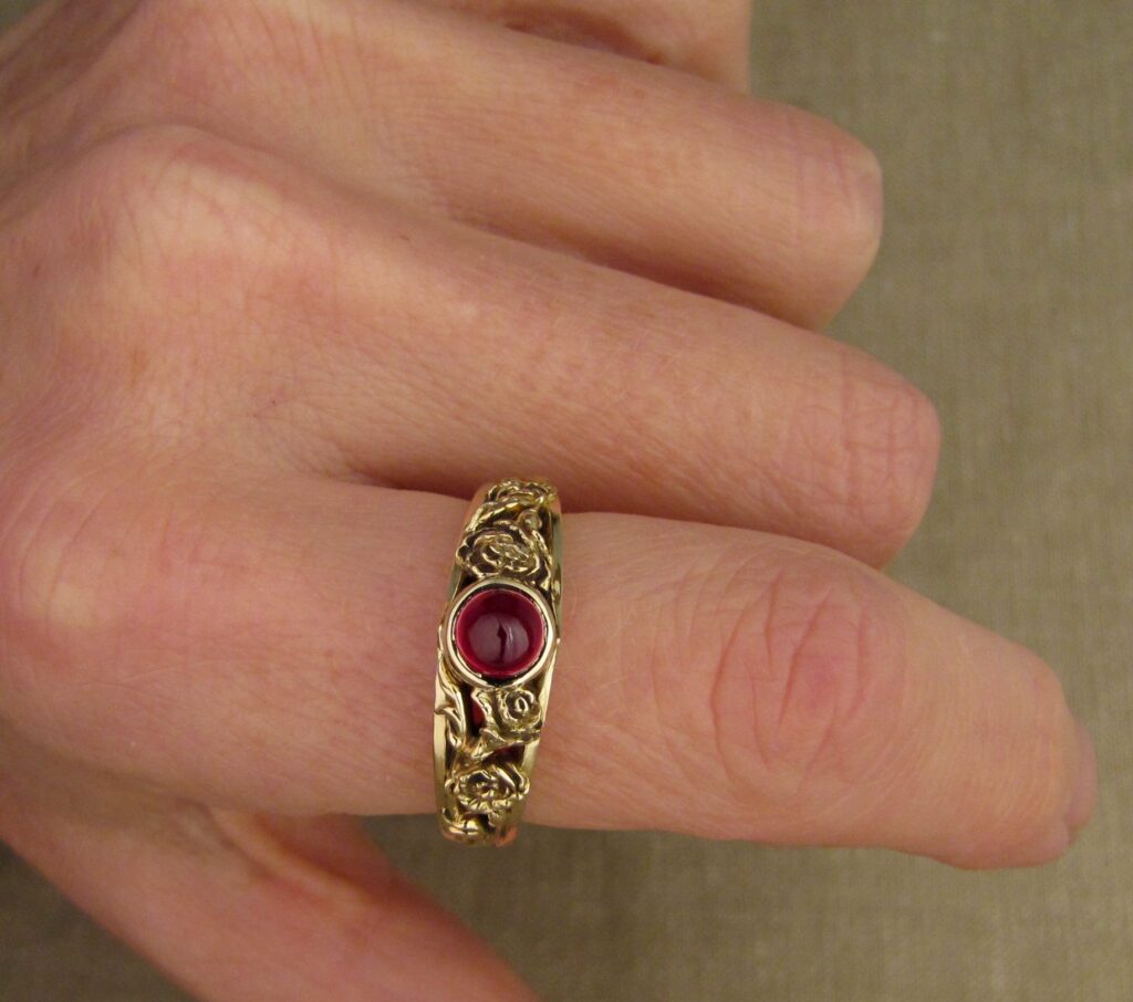 Custom designed & hand-carved Carnations solitaire with cabochon ruby, 14K gold, cheyenne weil