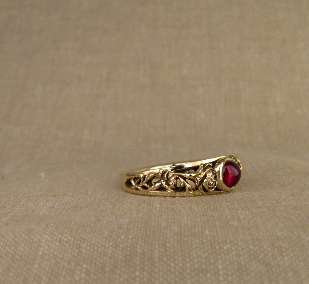 Custom designed & hand-carved Carnations solitaire with cabochon ruby, 14K gold, cheyenne weil