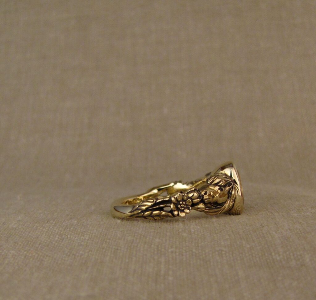 Custom carved Icelandic horses solitaire with Imperial topaz, 14K yellow gold, Cheyenne Weil