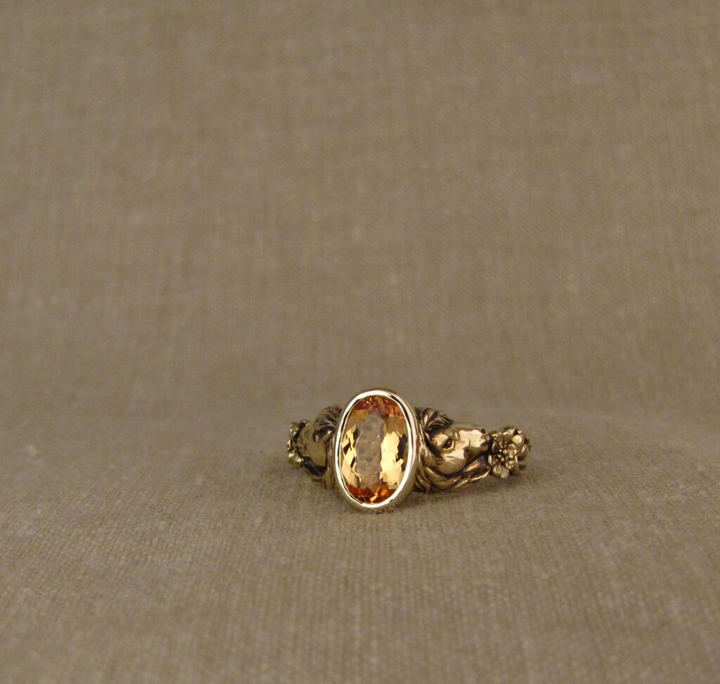 Custom carved Icelandic horses solitaire with Imperial topaz, 14K yellow gold, Cheyenne Weil