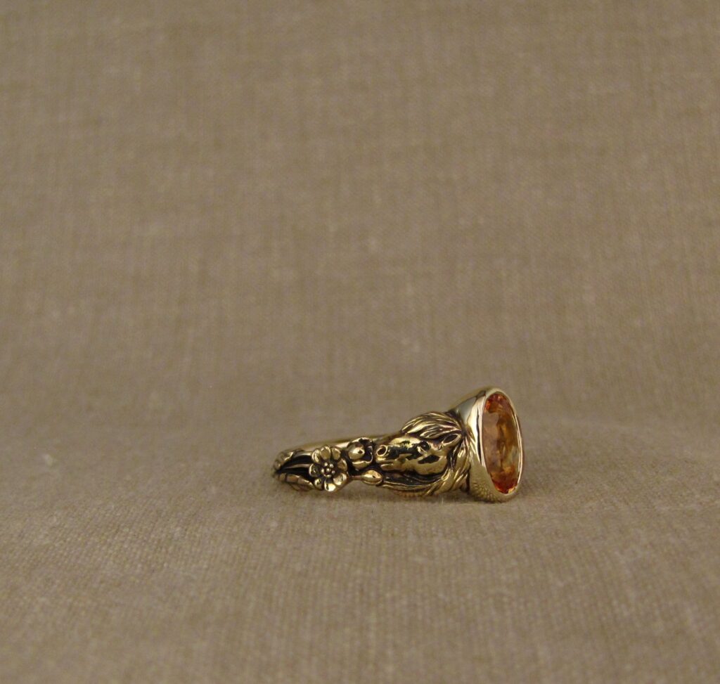 Custom carved Icelandic horses solitaire with Imperial topaz, 14K yellow gold, Cheyenne Weil
