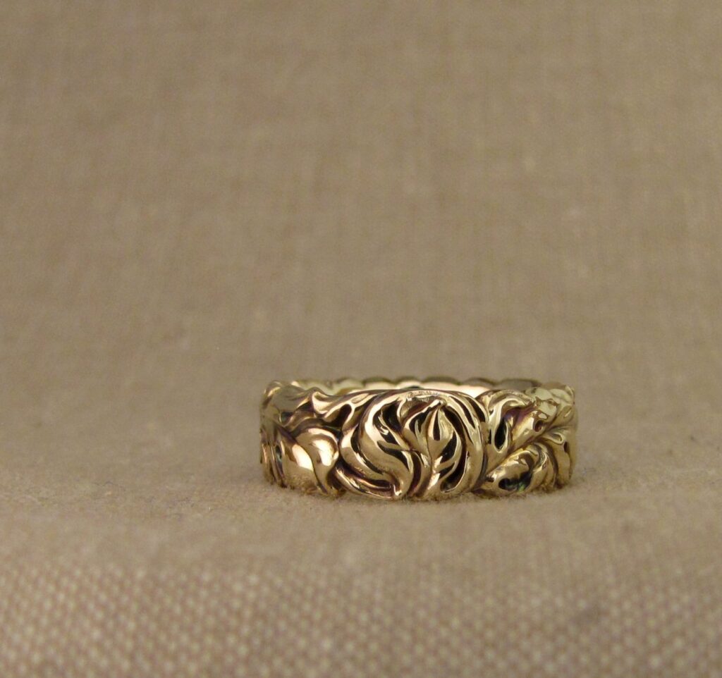 Hand carved Acanthus-Rococo leaves wedding bands in 14K gold. Cheyenne Weil