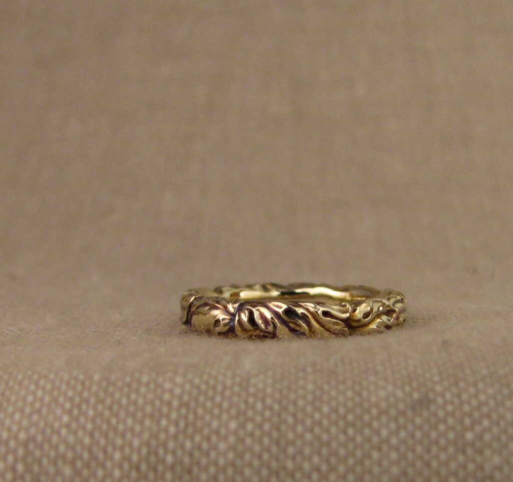 Hand carved Acanthus-Rococo leaves wedding bands in 14K gold. Cheyenne Weil