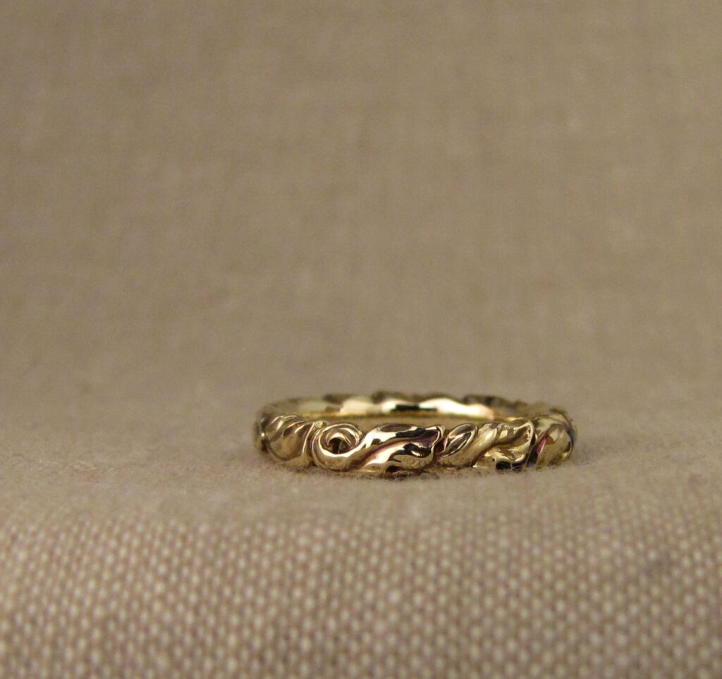 Hand carved Acanthus-Rococo leaves wedding bands in 14K gold. Cheyenne Weil