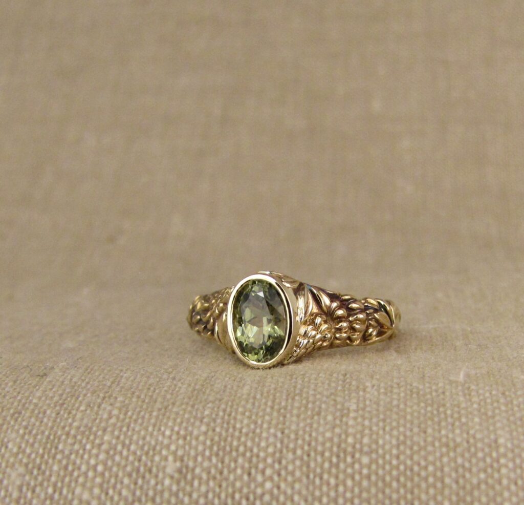 Custom carved Lupine Solitaire, Green Sapphire and 14K gold, Cheyenne Weil