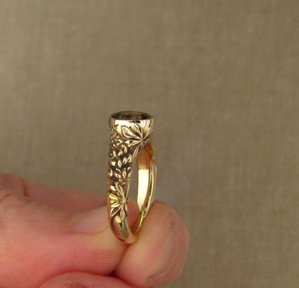 Custom carved Lupine Solitaire, Green Sapphire and 14K gold, Cheyenne Weil