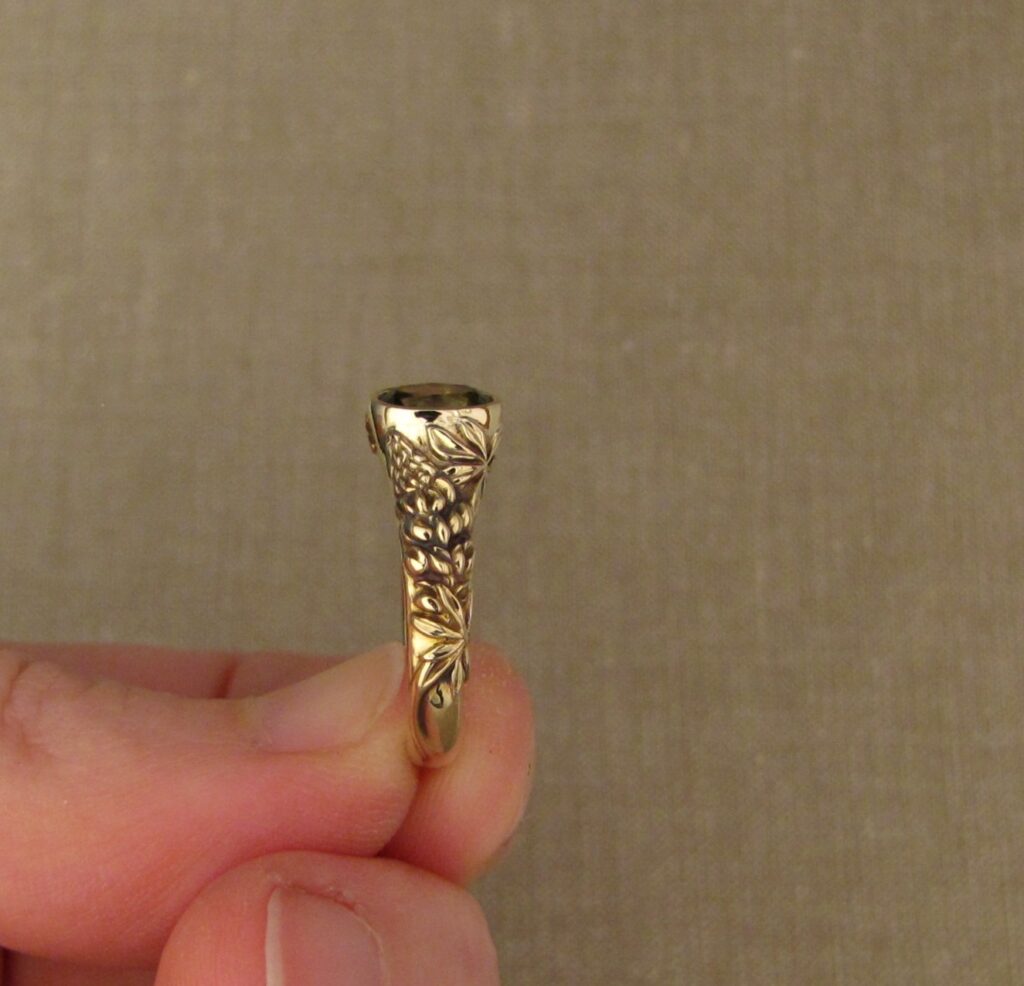 Custom carved Lupine Solitaire, Green Sapphire and 14K gold, Cheyenne Weil