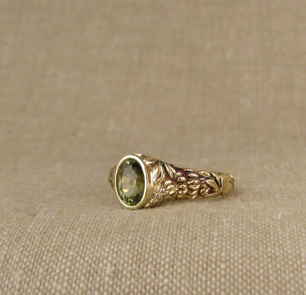 Custom carved Lupine Solitaire, Green Sapphire and 14K gold, Cheyenne Weil