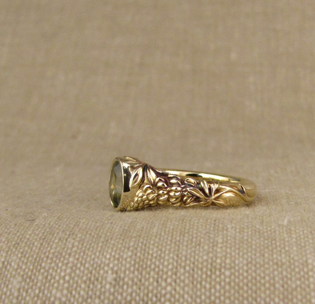 Custom carved Lupine Solitaire, Green Sapphire and 14K gold, Cheyenne Weil