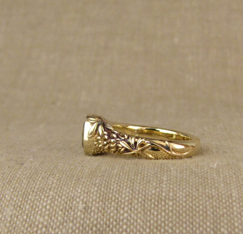 Custom carved Lupine Solitaire, Green Sapphire and 14K gold, Cheyenne Weil