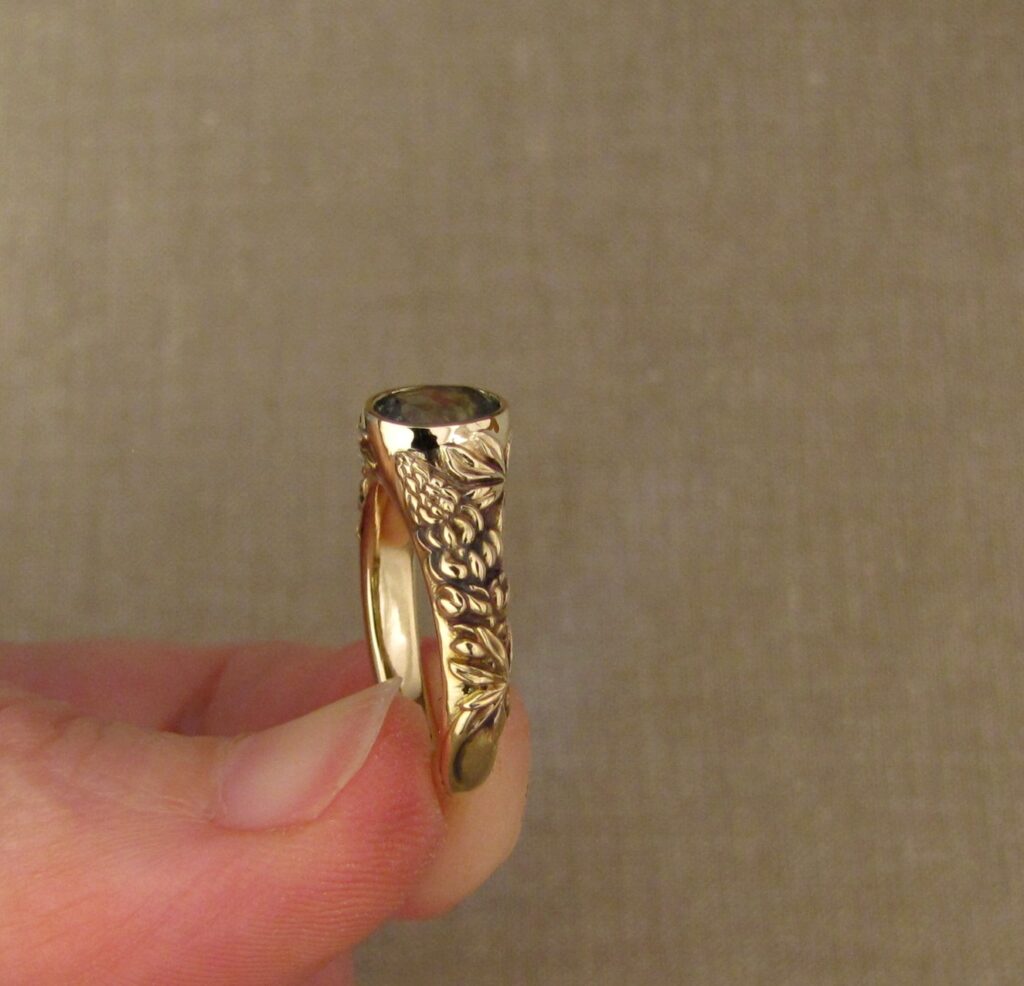 Custom carved Lupine Solitaire, Green Sapphire and 14K gold, Cheyenne Weil