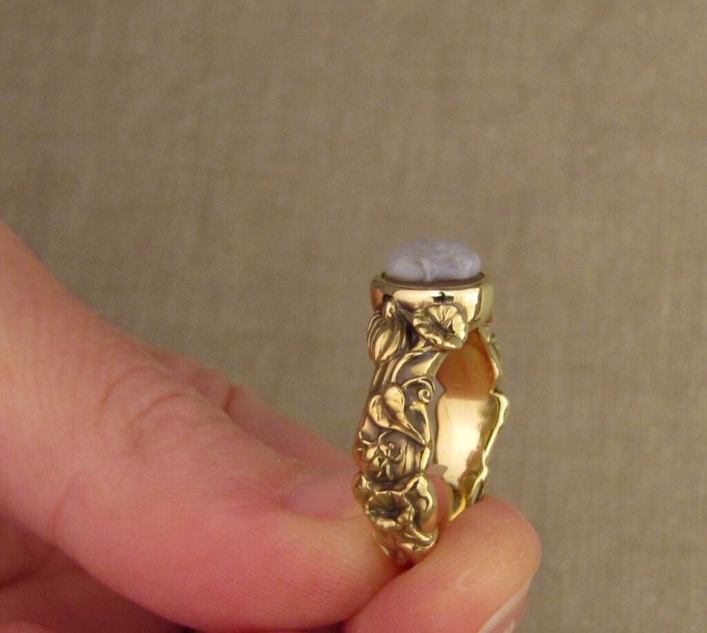 Memento Mori ring set with carved agate skull, bones, botanicals, bugs, 18K yellow gold. Cheyenne Weil