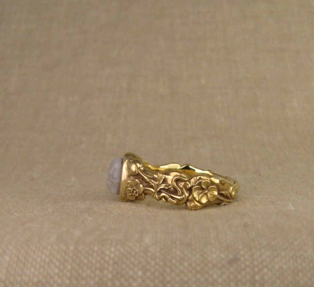Memento Mori ring set with carved agate skull, bones, botanicals, bugs, 18K yellow gold. Cheyenne Weil