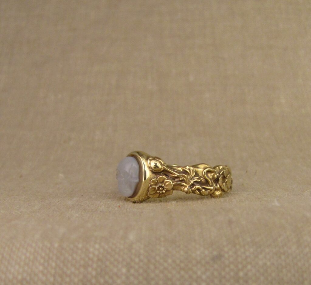Memento Mori ring set with carved agate skull, bones, botanicals, bugs, 18K yellow gold. Cheyenne Weil