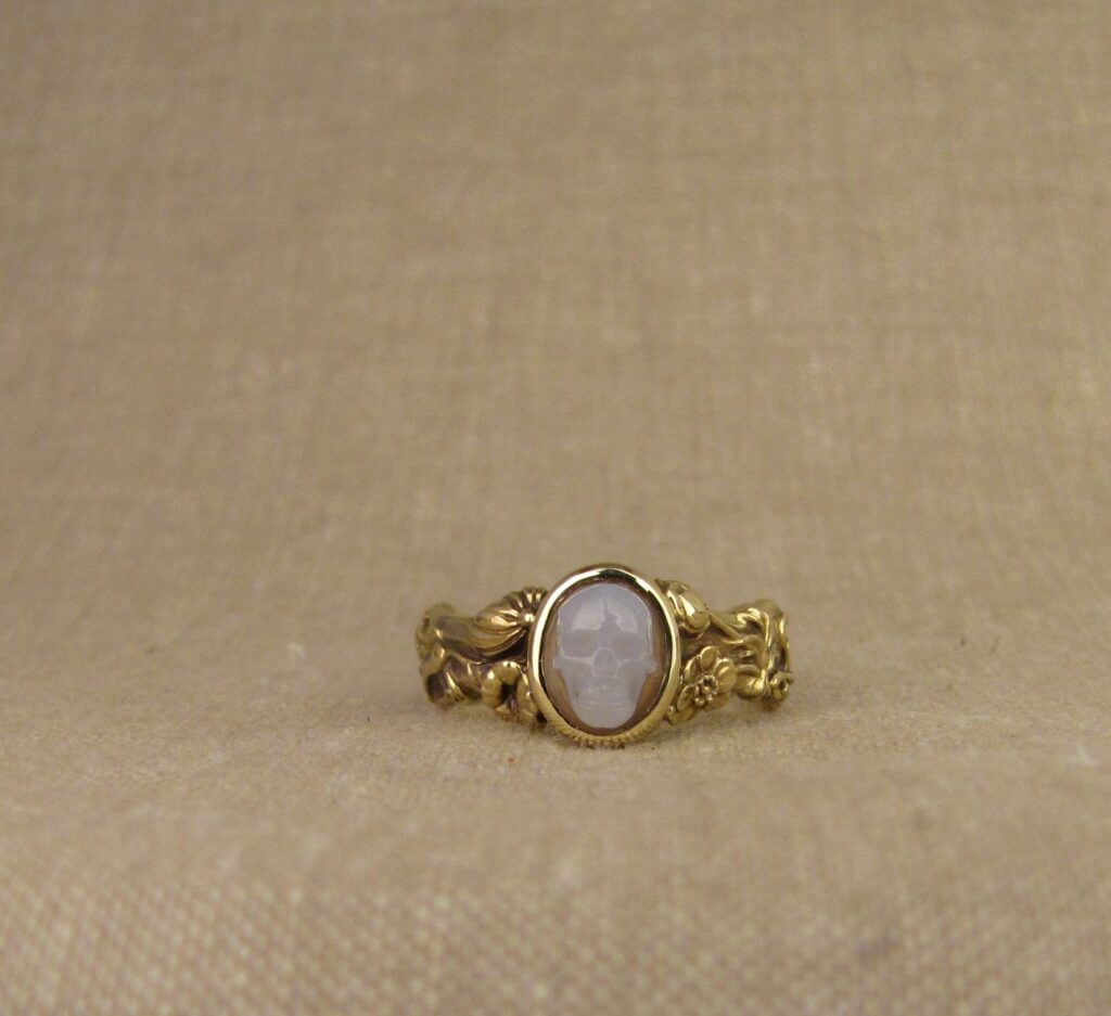 Memento Mori ring set with carved agate skull, bones, botanicals, bugs, 18K yellow gold. Cheyenne Weil