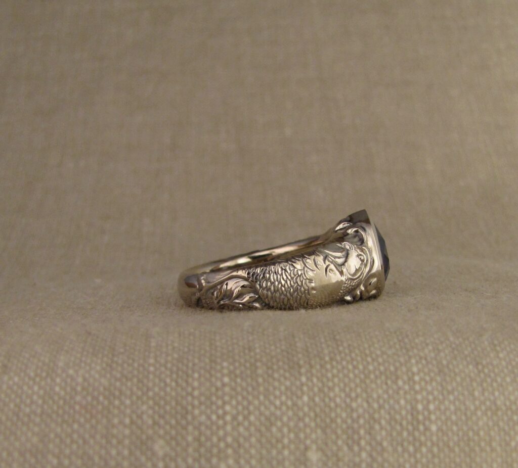 Custom carved Sapphire Solitaire with Quail and Cardinal motifs. Palladium white gold, Blue sapphire, Cheyenne Weil