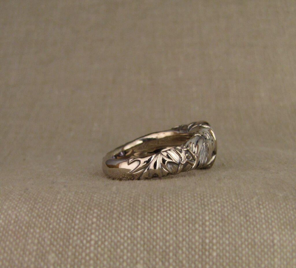 Custom carved Sapphire Solitaire with Quail and Cardinal motifs. Palladium white gold, Blue sapphire, Cheyenne Weil