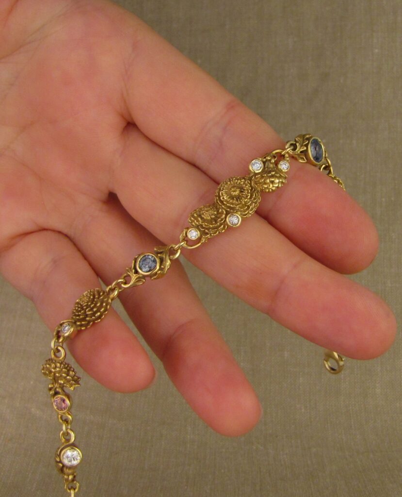 Custom carved Dandelions Bracelet with Montana Sapphires & Diamonds. 18K. Cheyenne Weil