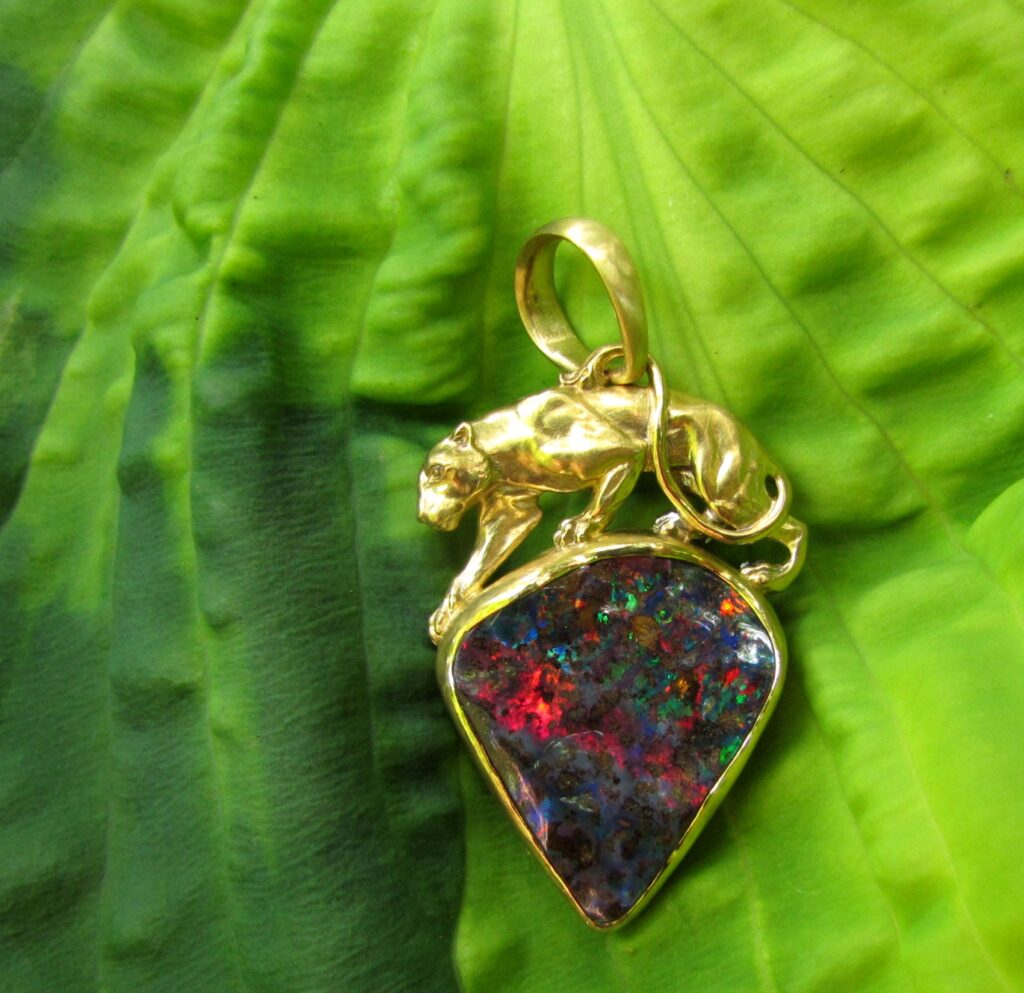 Custom carved Lioness Pendant in 22K, Rainbow Boulder Opal. Cheyenne Weil