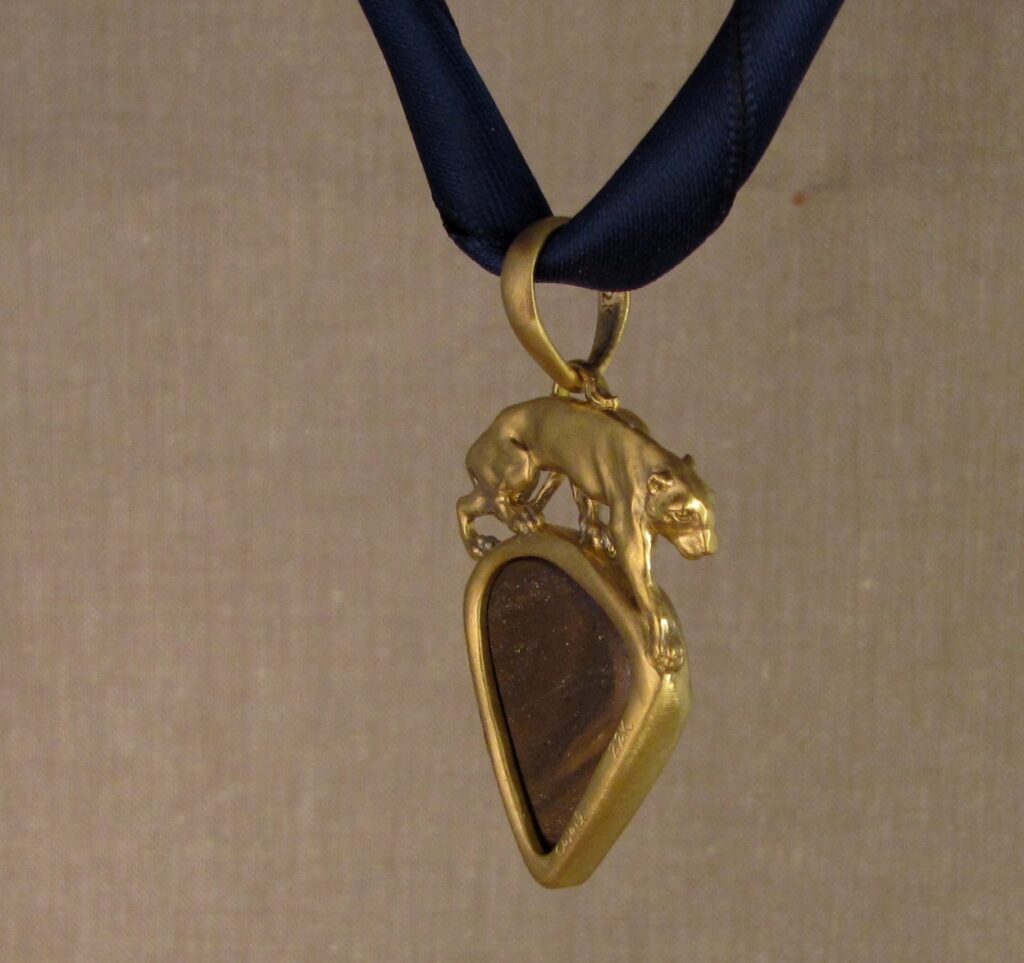 Custom carved Lioness Pendant in 22K, Rainbow Boulder Opal. Cheyenne Weil