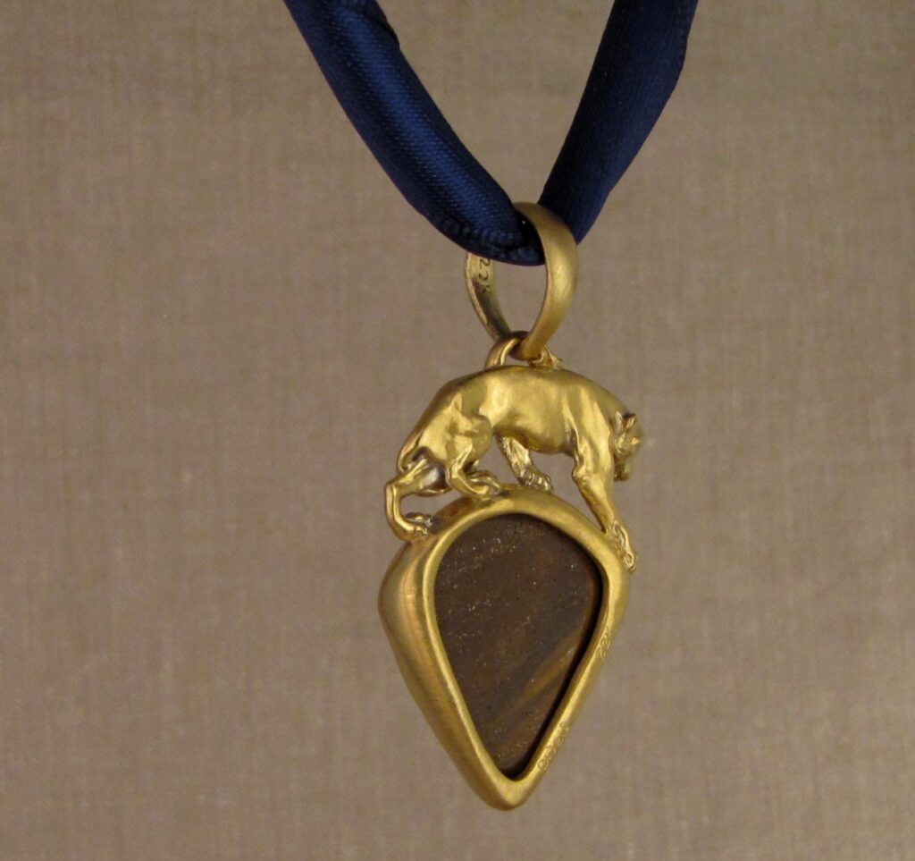 Custom carved Lioness Pendant in 22K, Rainbow Boulder Opal. Cheyenne Weil