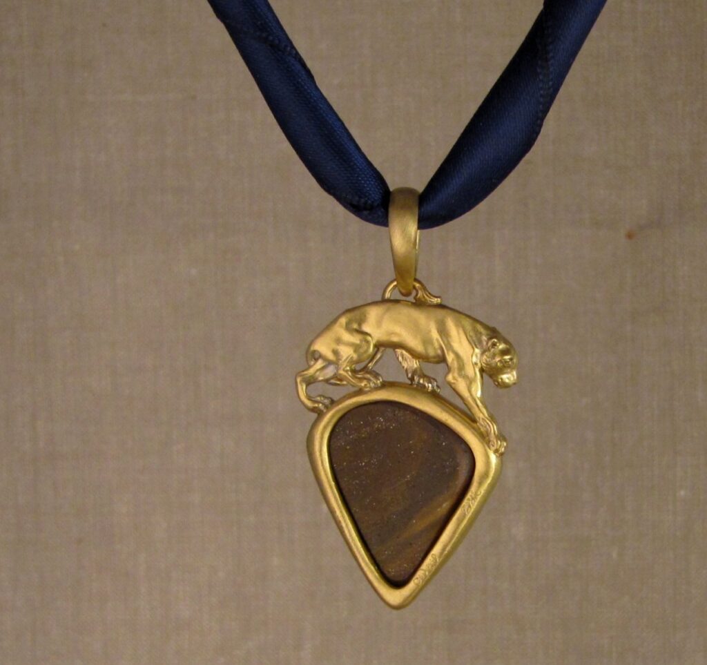 Custom carved Lioness Pendant in 22K, Rainbow Boulder Opal. Cheyenne Weil