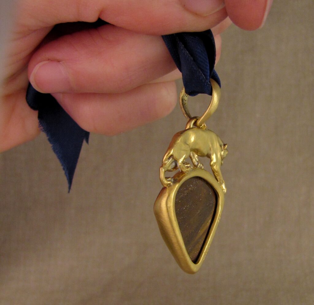 Custom carved Lioness Pendant in 22K, Rainbow Boulder Opal. Cheyenne Weil