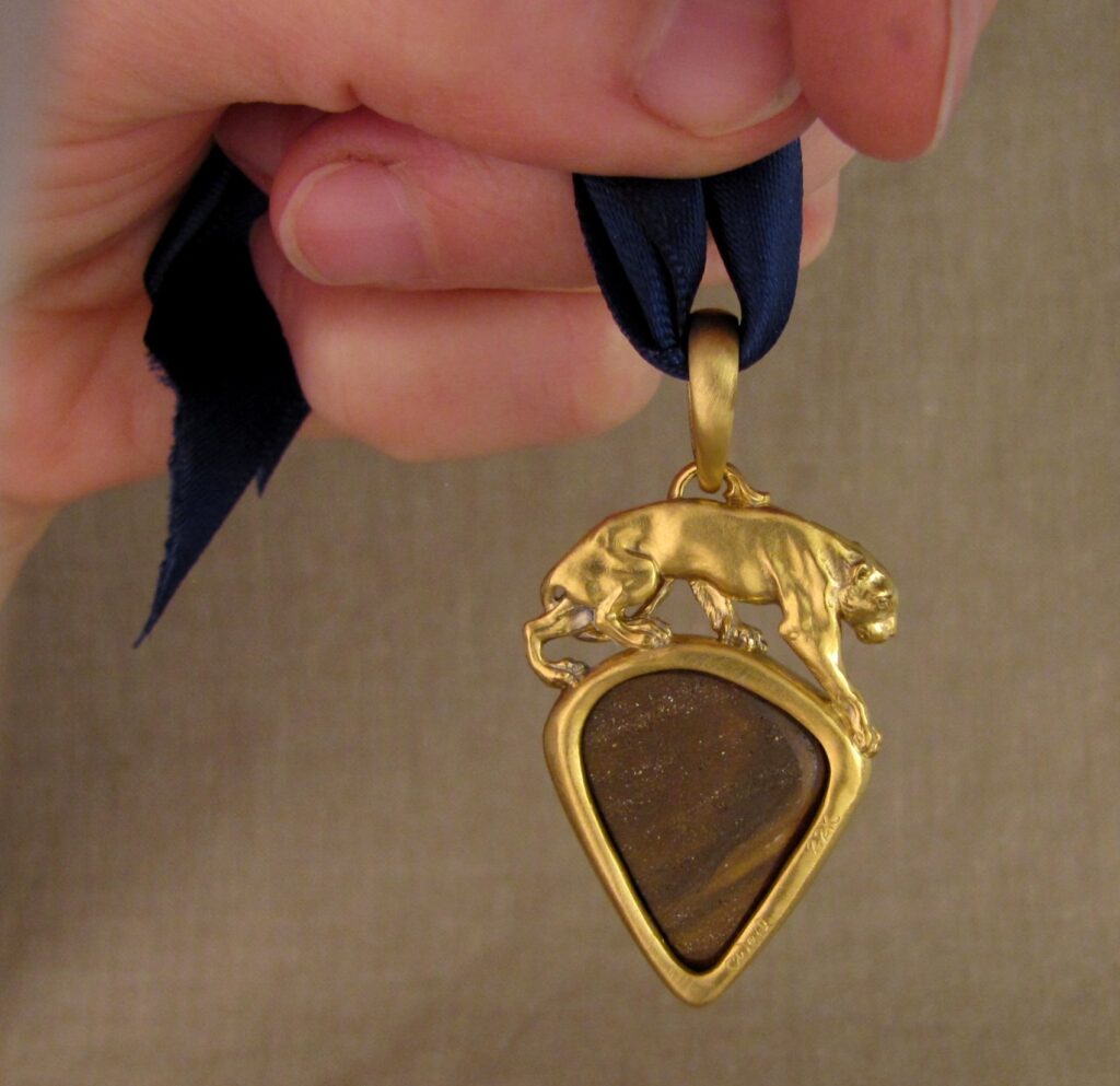 Custom carved Lioness Pendant in 22K, Rainbow Boulder Opal. Cheyenne Weil