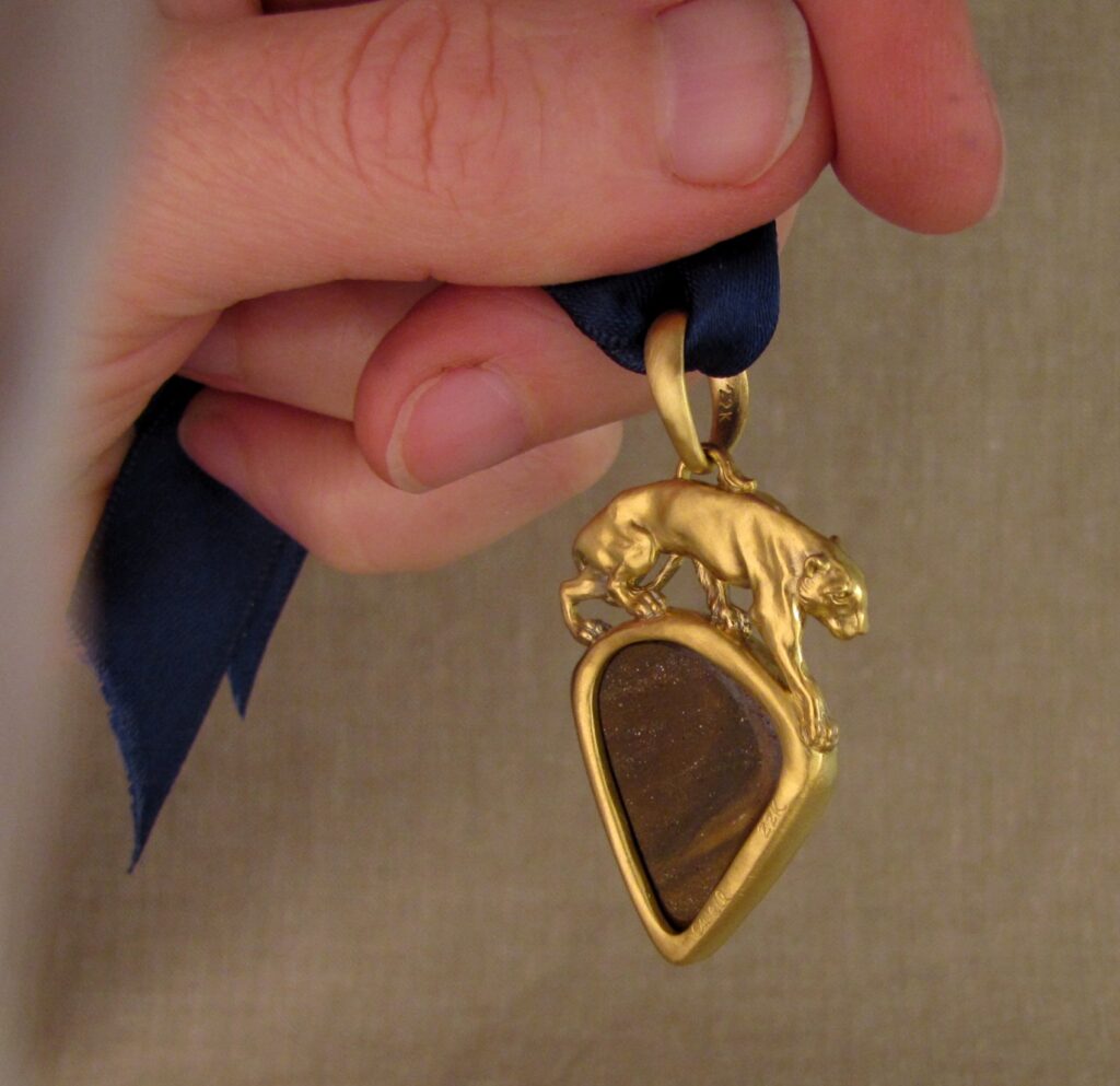 Custom carved Lioness Pendant in 22K, Rainbow Boulder Opal. Cheyenne Weil