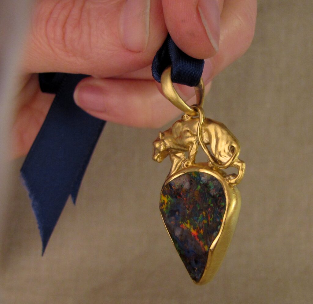 Custom carved Lioness Pendant in 22K, Rainbow Boulder Opal. Cheyenne Weil