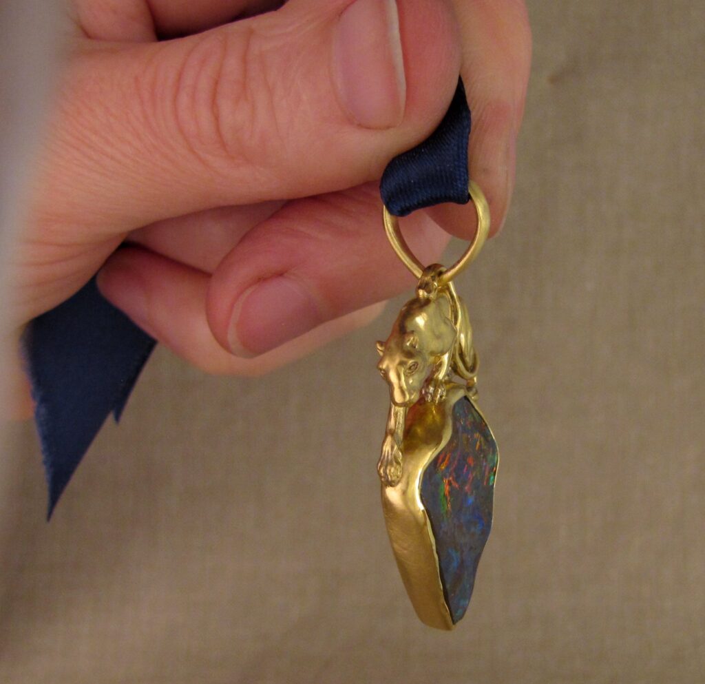 Custom carved Lioness Pendant in 22K, Rainbow Boulder Opal. Cheyenne Weil