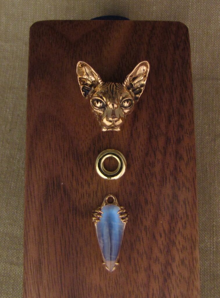 Custom designed & hand-carved Sphinx cat pendant components, 19K rose gold, 18K yellow gold, moonstone. Cheyenne Weil