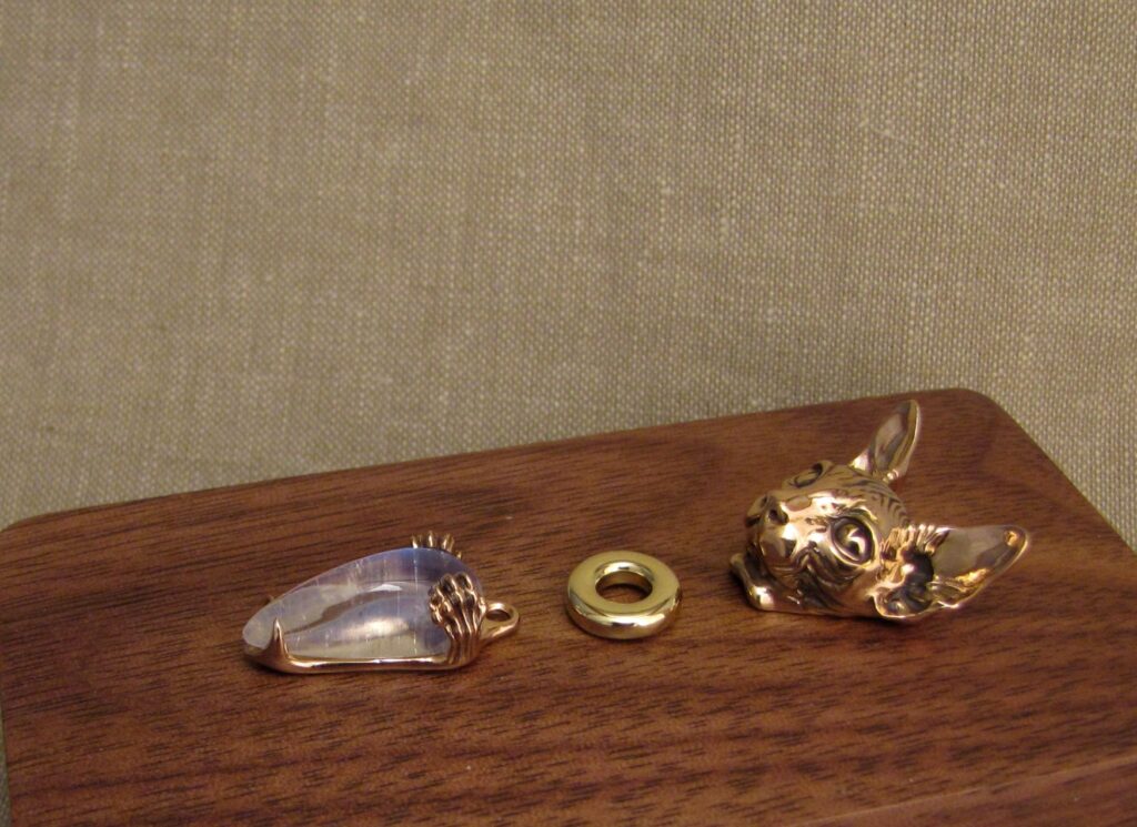 Custom designed & hand-carved Sphinx cat pendant components, 19K rose gold, 18K yellow gold, moonstone. Cheyenne Weil