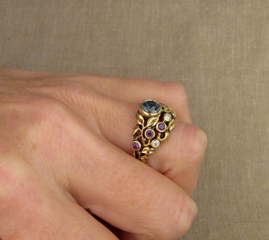 Custom designed & hand carved Blueberry Ring with Sapphire, Diamonds, and color-change garnets, 18K. Cheyenne Weil