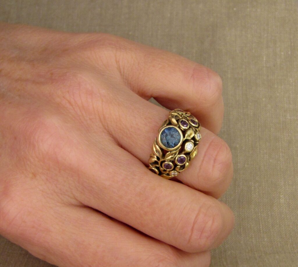 Custom designed & hand carved Blueberry Ring with Sapphire, Diamonds, and color-change garnets, 18K. Cheyenne Weil