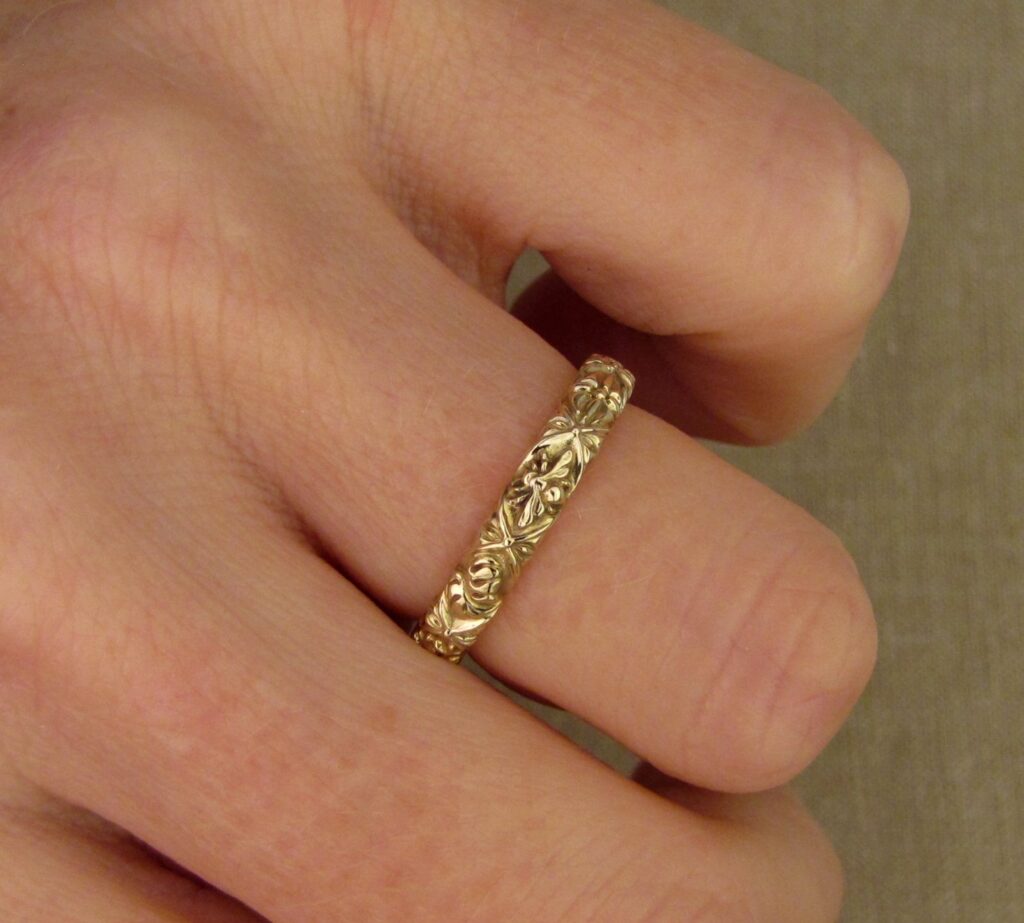 Custom designed & hand-carved Azulejos Storybook Band in 14K gold. cheyenne weil