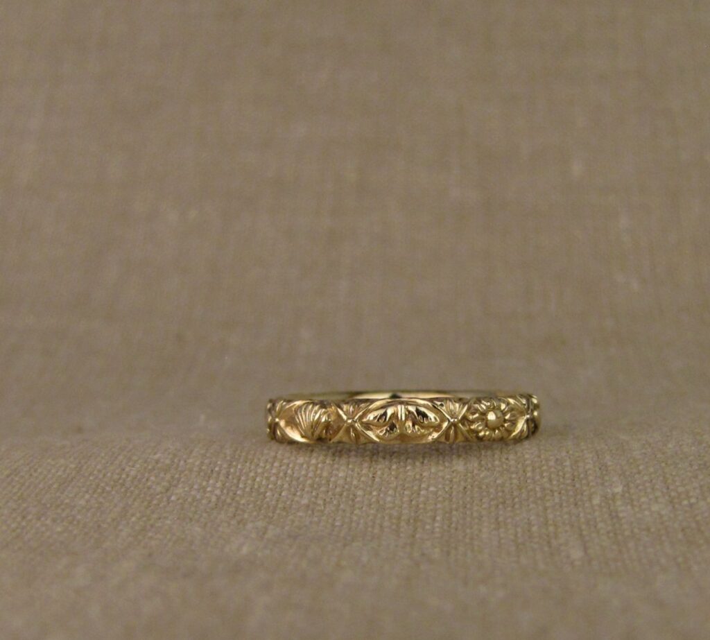 Custom designed & hand-carved Azulejos Storybook Band in 14K gold. cheyenne weil