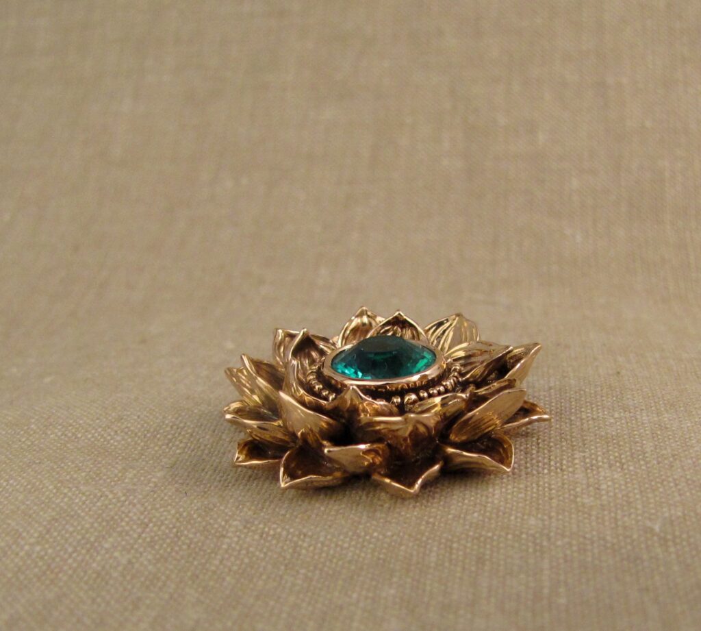 Custom designed & hand carved Lotus Pendant in 19K rose gold with emerald center. cheyenne weil