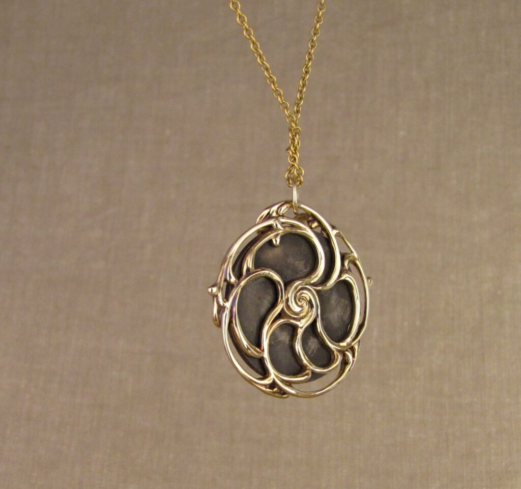 Custom designed & hand-carved pendant mounting for antique Japanese shakudo medallion. 14K. Cheyenne Weil 
