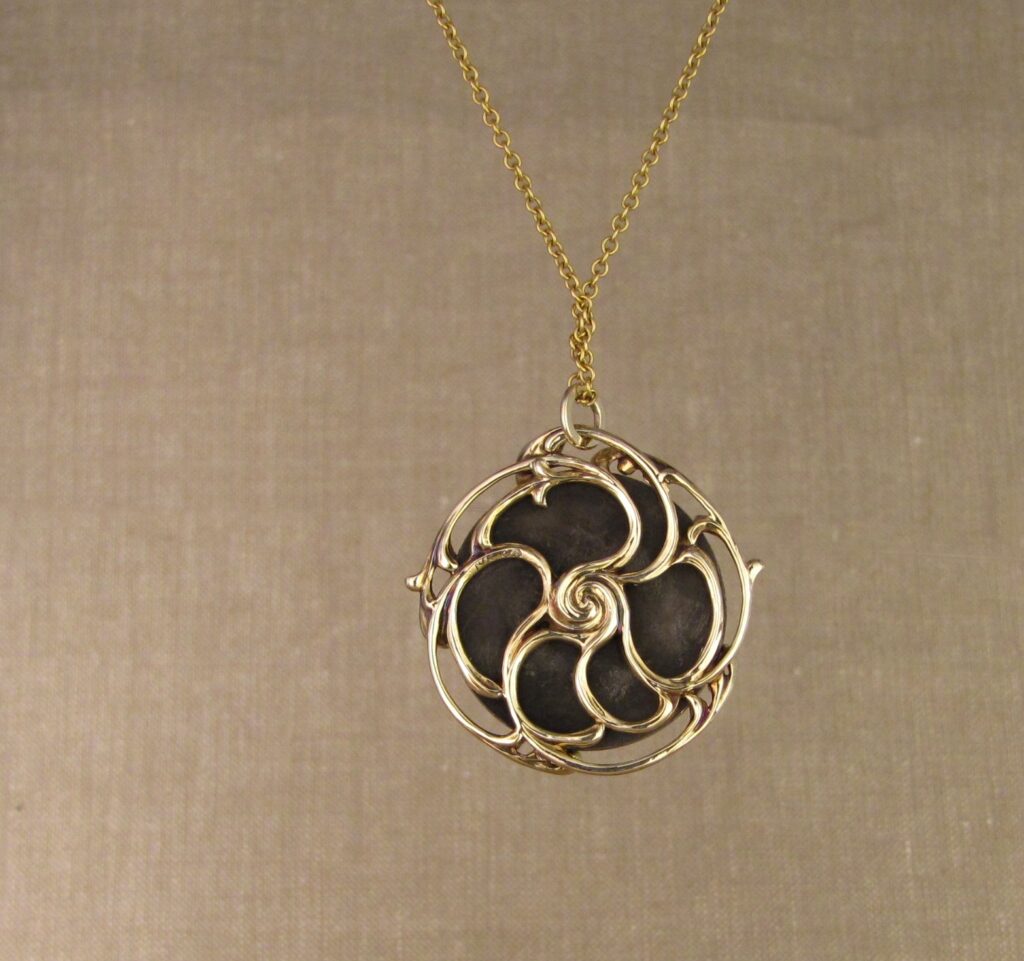 Custom designed & hand-carved pendant mounting for antique Japanese shakudo medallion. 14K. Cheyenne Weil 