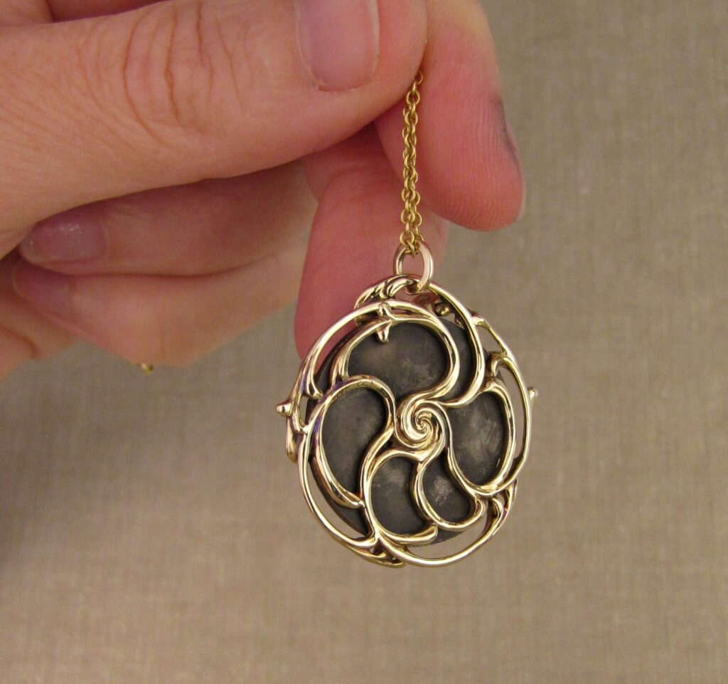 Custom designed & hand-carved pendant mounting for antique Japanese shakudo medallion. 14K. Cheyenne Weil 
